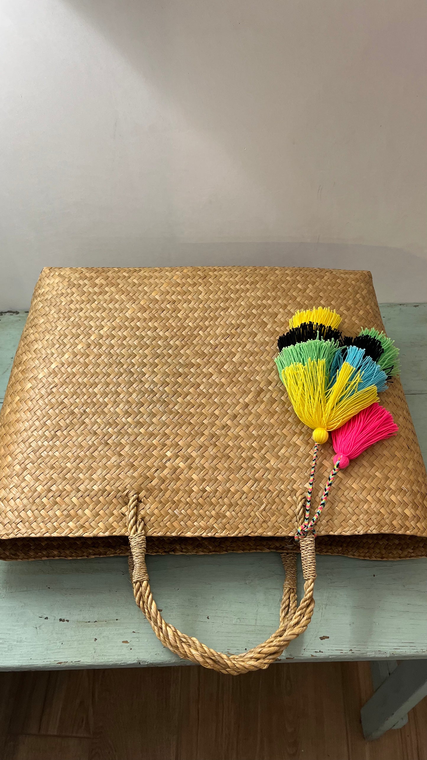 Pom pon per borsa di paglia