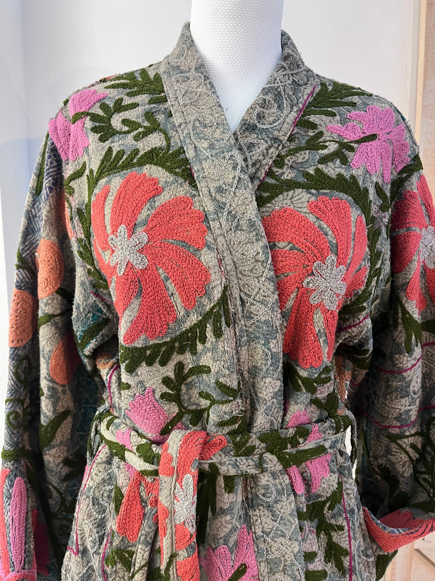 Hand-embroidered coat with belt