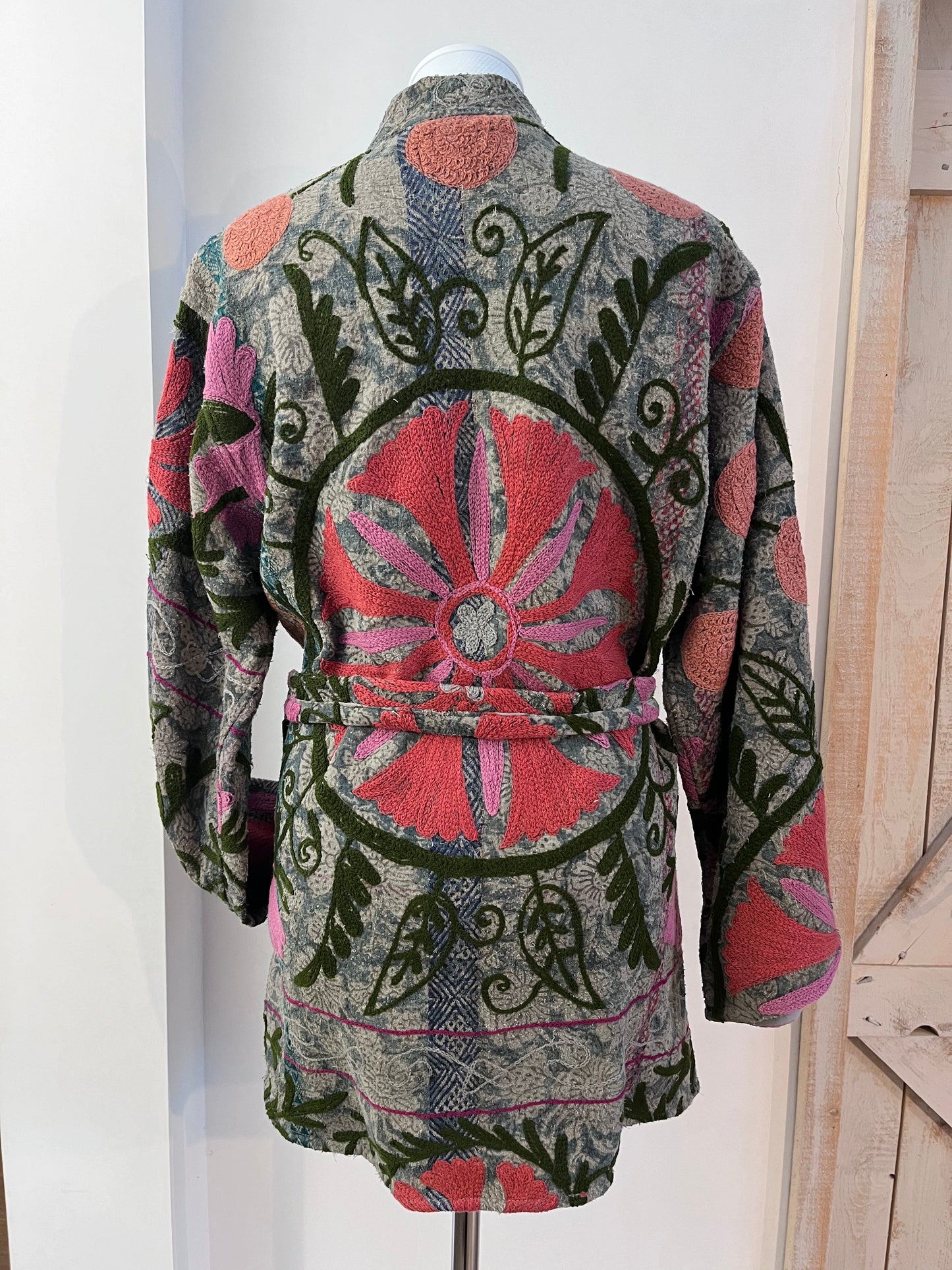 Hand-embroidered coat with belt