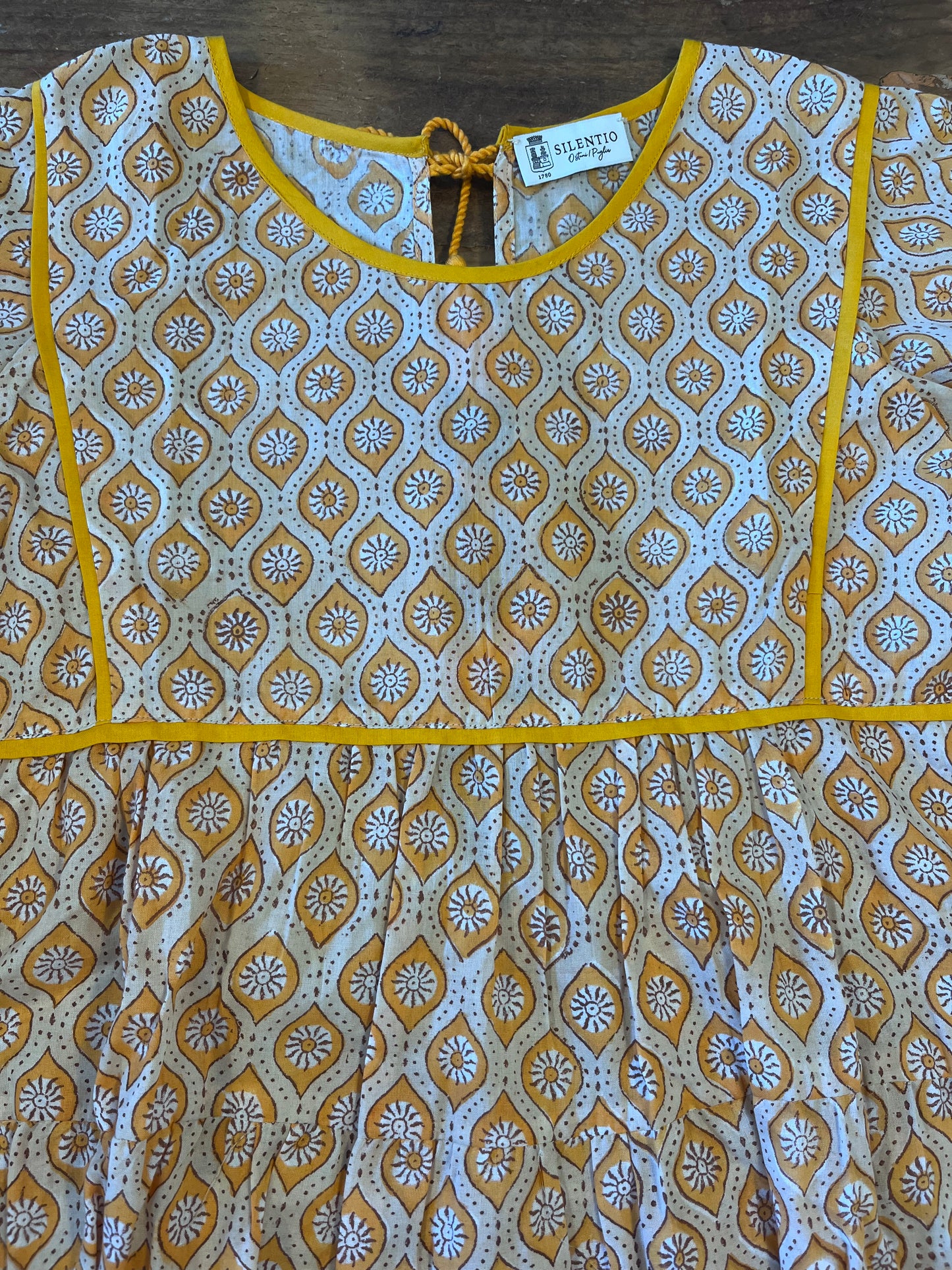 Top di cotone stampato mano
